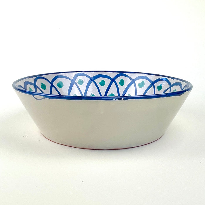 Spanish Fajalauza bowl with green and blue hand painted decoration, made as a deep Granada pottery platter with a wide rounded form and glossy glazed surface. The design includes cobalt lattice lines, abstract green vegetal marks, and a blue rim, suitable as ceramic wall bowl decor, tabletop display, or decorative fruit bowl.