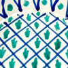 Fajalauza ceramic bowl from Granada style pottery, decorated with loose cobalt blue lines and green vegetal marks arranged within a grid pattern. The hand painted surface, blue rim, and deep lebrillo form make it useful as a decorative wall bowl, ceramic centerpiece, or Spanish pottery accent for cottage decor and rustic home decor.