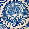 close-up of the palm motif’s central leaves and fronds painted in rich cobalt blue, showing the glaze texture and brushstroke variation achieved by the artisan potter in this 19th-century ceramic piece.