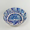 Large Antique Spanish Fajalauza lebrillo bowl from Granada featuring a cobalt hand-painted palm tree in the center and rhythmic wave motifs around the rim, photographed from the front to showcase its full decorative surface and historic Andalusian ceramic design.