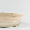 Profile view of the 9 cm tall Fajalauza bowl highlighting the flared form, subtly warped rim, and natural irregularities of its wheel-thrown structure, emblematic of handcrafted 19th-century Andalusian ceramic practices.