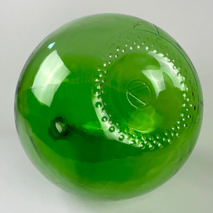 Base of the vintage French green glass demijohn showing the heavy recessed construction, raised glass details, and embossed workshop mark that distinguishes this vessel from unmarked examples. This manufacturing detail contributes collector interest and provenance while documenting the original structure of the substantial 25 L wine carboy.