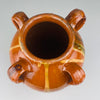 Jar viewed from above, showing narrowed neck and symmetrical looped handles, ideal for Mediterranean kitchen styling or antique pottery displays in rustic homes, ceramic shops, or collector presentations.