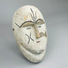 Vintage African tribal mask with ceremonial white pigment and carved wood design, showcasing abstract facial geometry, ideal for rustic home styling, wabi-sabi collections, or collectors of African ethnographic art pieces.