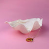 Minimalist art pendant crafted as a wearable sculpture, plated in gold over bronze. Hand-carved in wax by Laragh Stuart, this pendant reflects the lost-wax tradition. Ideal for modern jewelry collectors, gallery-inspired fashion, and contemporary design enthusiasts.