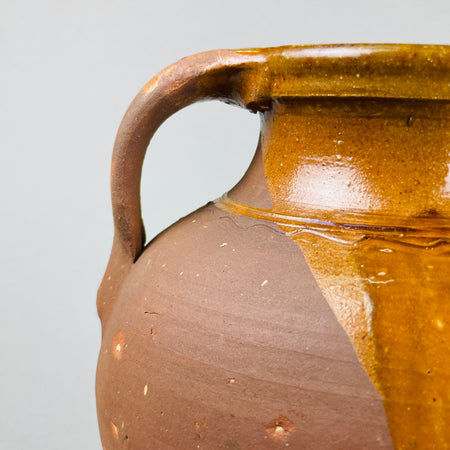Close-up of one handle with natural patina