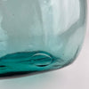 Vintage blue glass bottle vase from Spain, identifiable as a Viresa demijohn or wine carboy by the embossed neck and traditional rounded storage-bottle form. The hand blown glass shows natural bubbles and a worked base, details that collectors look for in authentic Spanish glass, and it styles well as a statement centerpiece in vintage home decor.