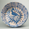 Large vintage Spanish basin in traditional Andalusian Fajalauza style, showcasing blue hand-painted patterns over cream background with natural glaze imperfections