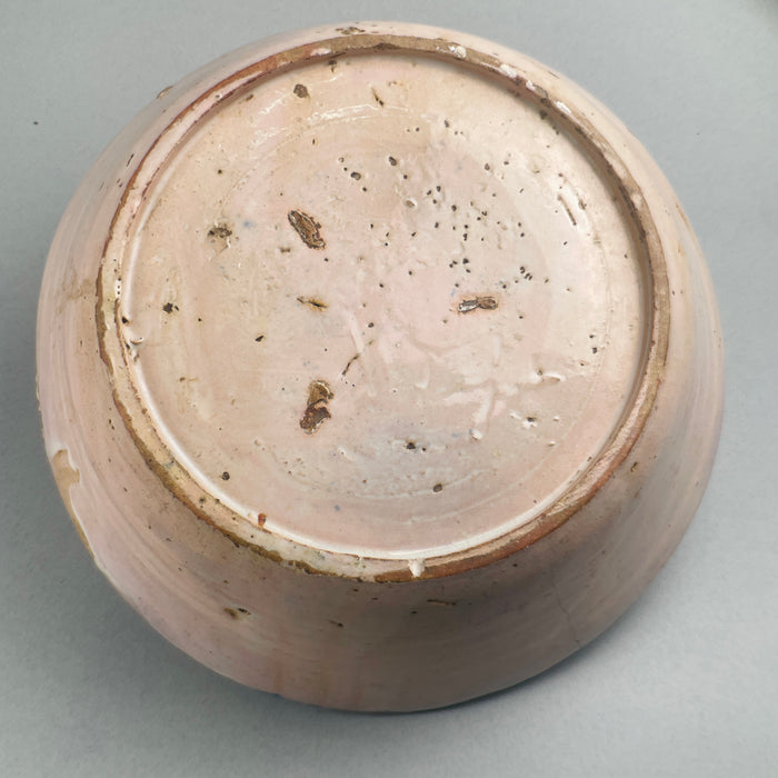 Underside of fajalauza spanish antique bowl showing aging process consistent with age and confirming its authenticity.