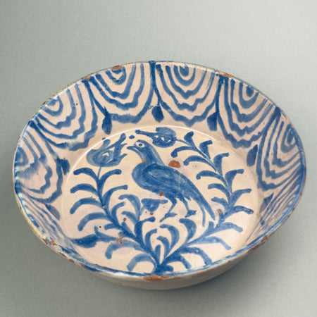 Hand-thrown Spanish traditional Fajalauza cobalt blue and white pottery basin from early 20th century Spain, richly decorated with bird and floral designs, ideal for Mediterranean-style interior decoration or farmhouse kitchens.