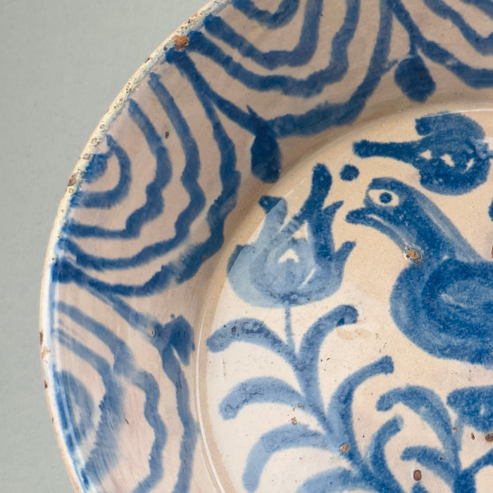 Folk art pottery basin from Granada Spain, featuring vibrant cobalt blue decoration and rustic Mediterranean charm.