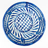 Traditional Fajalauza brushwork across the white glazed terracotta surface, with dense cobalt blue strokes forming leaves, scalloped bands and geometric ornament. Variations in pigment density, visible bristle marks and slight glaze irregularities confirm the handcrafted character of this Cerámica Los Arrayanes bowl from Granada, Spain.