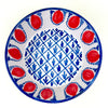Hand thrown Spanish ceramic lebrillo bowl with a thick terracotta body, glazed cream interior, blue rim, and repeated red pomegranate decoration. The form follows the Andalusian lebrillo tradition while the original ROC design gives it contemporary appeal for coastal decor, farmhouse decor, and layered ceramic displays.