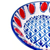 Contemporary ROC Objects Fajalauza style lebrillo bowl, hand painted and hand thrown in Granada, Spain. The red and blue decoration references Moorish-Andalusian ceramic patterning, while the deep bowl shape and terracotta body make it a strong decorative ceramic accent for cottage decor, coastal decor, and farmhouse decor.