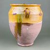 Wide frontal shot showing the pot’s volume, handles, and overall silhouette, ideal as a product hero image. The pot's weathered glaze and historic patina enhance its value as both a functional and decorative piece in Mediterranean-style homes.