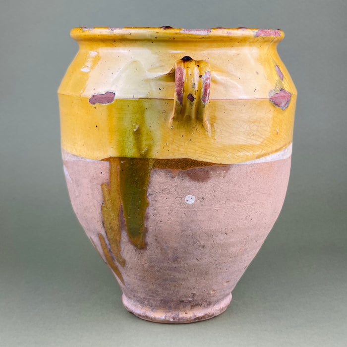 Wide frontal shot showing the pot’s volume, handles, and overall silhouette, ideal as a product hero image. The pot's weathered glaze and historic patina enhance its value as both a functional and decorative piece in Mediterranean-style homes.