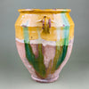 Rear view of the antique terracotta confit pot showcasing uneven glaze application and rustic imperfections. Ideal for authentic French country decor or collectors of vintage Mediterranean ceramics with visible patina and aged surface details.