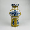 Lower section detail of Vintage French Quimper vase, revealing ochre glaze over terracotta with elongated abstract motifs. Exemplifies the Quimper Modernist School, blending modernism with French rustic home decor sensibility.