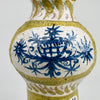 Close-up of the Antique French Quimper faience vase, focusing on hand-painted geometric motifs inspired by Breton modernism. The form reflects mid century modern design with a strong sculptural presence suited for organic modern decor and rare French pottery collectors.