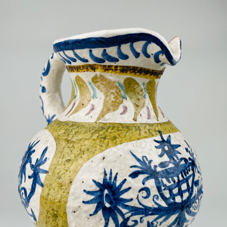Side view of Vintage French Quimper vase featuring abstract blue brushwork and ochre glazing. A rare example of French modernism, combining regional faience heritage with mid century decor aesthetics ideal for rustic farmhouse decor or art pottery displays.