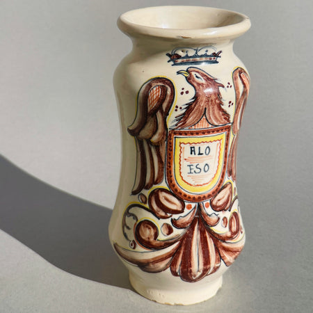 Side profile of the 24cm tall 19th-century Spanish albarello jar, showing elegant form.