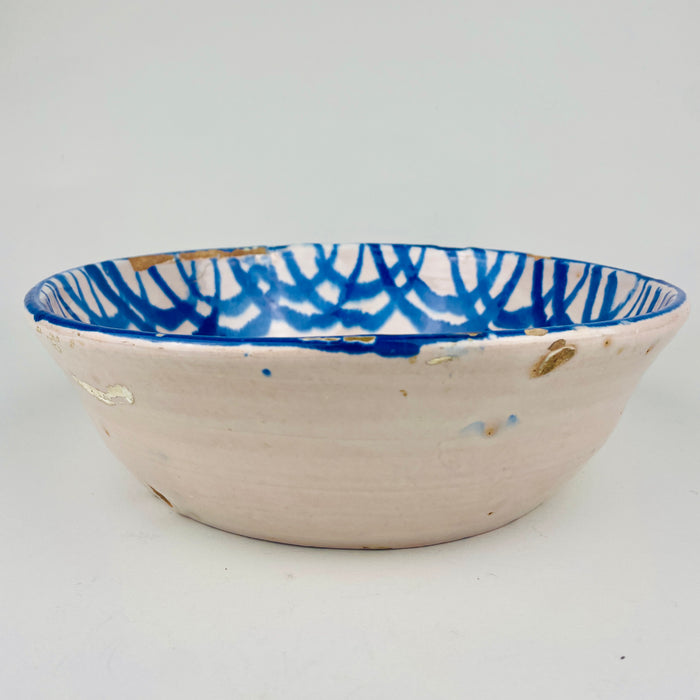 Large antique Andalusian ceramic lebrillo with pierced hanging holes, traditional Spanish cobalt blue brushwork, tin-glazed surface and visible hand painted variation, perfect for Vintage Home Decor, Mediterranean Decor, Coastal decor, Rustic Home Decor, Cottage Decor, wabi sabi collecting, Japandi interiors and Vintage Kitchen wall accents.