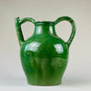 Full view of antique French green terracotta gargolette standing upright against neutral background
This long-necked antique French green terracotta gargolette water jug is shown in full upright profile, highlighting its double-handle construction, vibrant emerald green glaze, and sculptural farmhouse silhouette—perfect for Mediterranean or rustic interior styling.