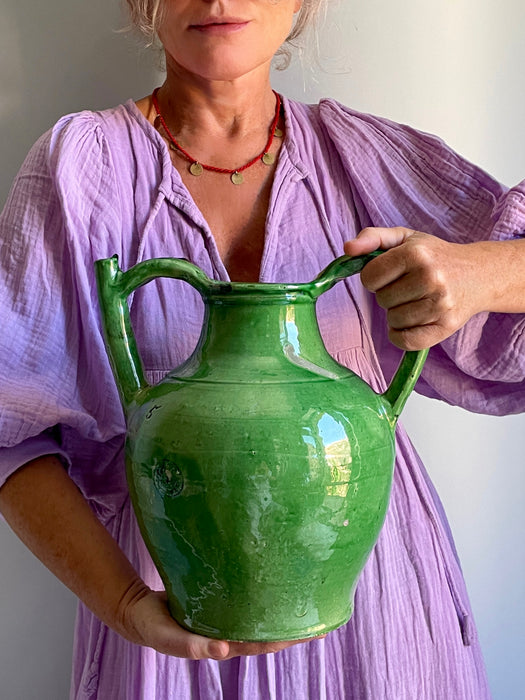 Final stylized full-body image with natural daylight casting shadows over glaze
Captured in natural light, the full profile of the French green terracotta gargolette reveals dynamic shadows, emphasizing glaze sheen and volume. Perfect for showcasing as a standalone design object in a Mediterranean or wabi-sabi decor scheme.