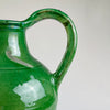 Zoomed detail of the spout and neck showing hand-pinched construction and internal ochre glaze
A close crop of the gargolette's spout and neck displays the pinched lip used for pouring and the glossy ochre-toned interior glaze, key features of historic French terracotta water vessels crafted in the Provence and Southwest regions.