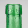 Vintage green glass demijohn vase by VIRESA of Valencia, Spain, circa 1960s, with the maker and 5 L capacity moulded around its reinforced neck. The pale sea green body deepens to emerald at the rim and base, emphasizing the thickness of the glass. Used empty or with foliage, this Spanish wine carboy brings color and history to eclectic decor.