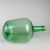 Embossed 5 L capacity mark beside the VIRESA name on the neck of this circa 1960s Spanish green glass carboy. The mould blown demijohn was formed as a durable container for wine and other liquids, with a thick rounded lip, tapered neck and transparent sea green body. Its compact proportions make it suitable as a table vase or console centerpiece.