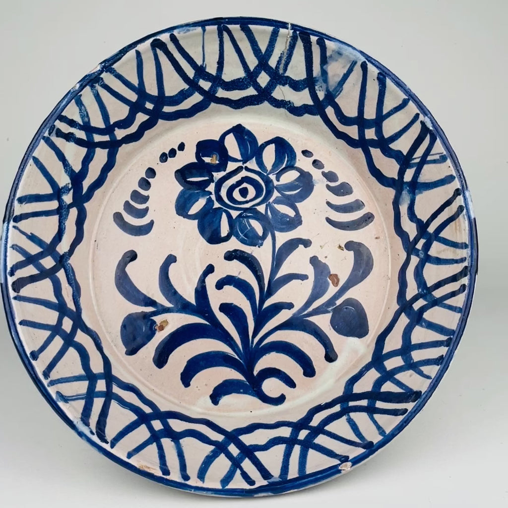 Large antique Andalusian ceramic lebrillo with pierced hanging holes, traditional Spanish cobalt blue brushwork, tin-glazed surface and visible hand painted variation, perfect for Vintage Home Decor, Mediterranean Decor, Coastal decor, Rustic Home Decor, Cottage Decor, wabi sabi collecting, Japandi interiors and Vintage Kitchen wall accents.