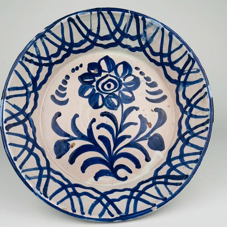 Large antique Andalusian ceramic lebrillo with pierced hanging holes, traditional Spanish cobalt blue brushwork, tin-glazed surface and visible hand painted variation, perfect for Vintage Home Decor, Mediterranean Decor, Coastal decor, Rustic Home Decor, Cottage Decor, wabi sabi collecting, Japandi interiors and Vintage Kitchen wall accents.